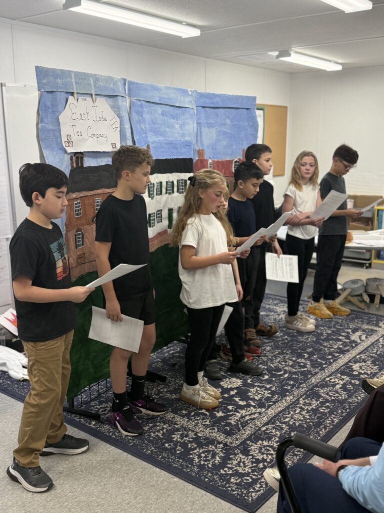 Lower School students presenting their work at Woodlawn School